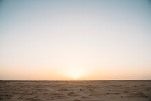 Sunset sky over arid desert