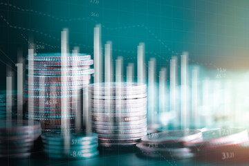 Stack of money coin with trading graph chart stock market. Value exchange and marketing of bank fund economic profit with growth. Finance investment and business concept.