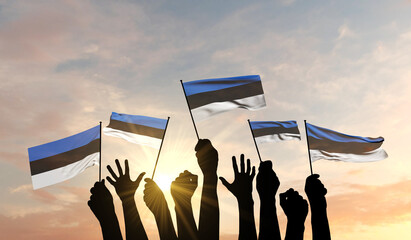 Sticker - Silhouette of arms raised waving an Estonia flag with pride. 3D Rendering