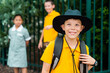 © Austockphoto - Happy cheeky school boy ready to go back to school