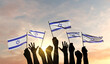 Silhouette of arms raised waving an Israel flag with pride. 3D Rendering
