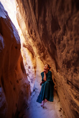 Wall Mural - Beautiful woman resting in the desert