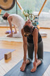 © ADDICTIVE STOCK - People kneeling and bend back in pose of ustrasana