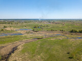 Fototapeta Do pokoju - Green meadow. Aerial drone view.