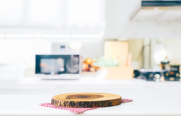 Wood table top on blurred kitchen background