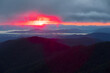 Morning sunlight peaking through mountain tops of the Blue Ridge Mountains in North Carolina.