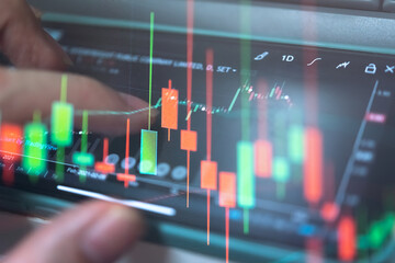 Candlestick chart in financial stock market on digital number background. Forex trading graphic design and Stock market trading trend as concept.