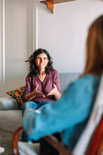 Psychology And Mental Therapy Concept - Spanish Woman Patient And Psychologist At Psychotherapy Session