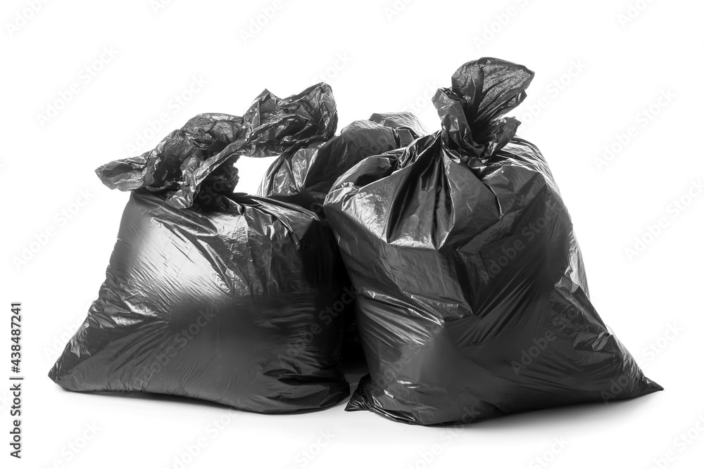 Bags with garbage on white background