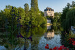 Castle Raoul with Red Flower and Reflection in Water in Chateauroux city, France