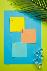 Fototapete - Tropical green background with exotic tropical palm leaf. Ice cubes. Blank colorful cards with space for text, Minimal summer concept, work motivation. escape from the office, integration trip, Flat