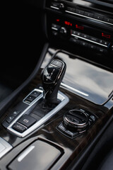 Wall Mural - Automatic transmission gear shift in modern car close up.