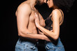 © LIGHTFIELD STUDIOS - Cropped view of african american woman touching sexy boyfriend isolated on black