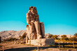  Colossus of Memnon in Luxor. Big statues near the Valley of Kings. Egypt