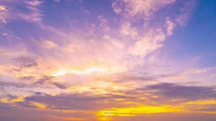 Wall Mural - 4K Time lapse of Majestic sunset or sunrise landscape Amazing light of nature cloudscape sky and Clouds moving away rolling 4k colorful dark sunset clouds Footage timelapse Beautiful light of nature