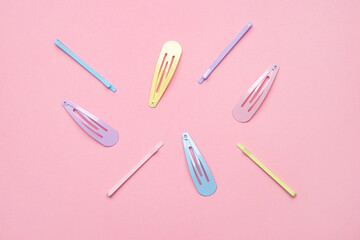 Group of colorful pastel color Hair Clips on Pink Background, Styled Shot,modern accessories for hair