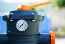 Pressure Gauge Measuring Water Pressure In A Sand Pump Of An Outdoor Pool Filtration System