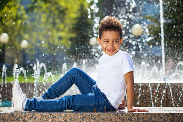 Wall Mural - Five year old little boy in summer park