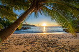 Fototapeta Do przedpokoju - sunset at tropical beach anse lazio on praslin on the seychelles