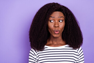 Sticker - Portrait of attractive cheerful girl looking aside guessing copy space pout lips isolated over violet purple color background