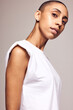 Androgynous female in white t-shirt