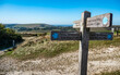 The South Downs Way, Sussex. A sign giving directions to the100 mile walking route between Winchester and Eastbourne in the south of England.