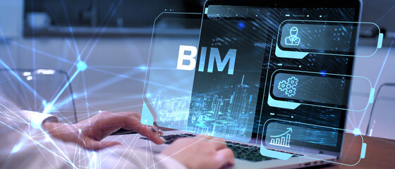 The concept of business, technology, the Internet and the network. A young entrepreneur working on a virtual screen of the future and sees the inscription: BIM