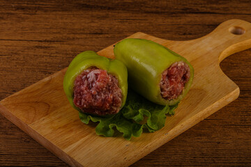 Raw stuffed pepper for cooking