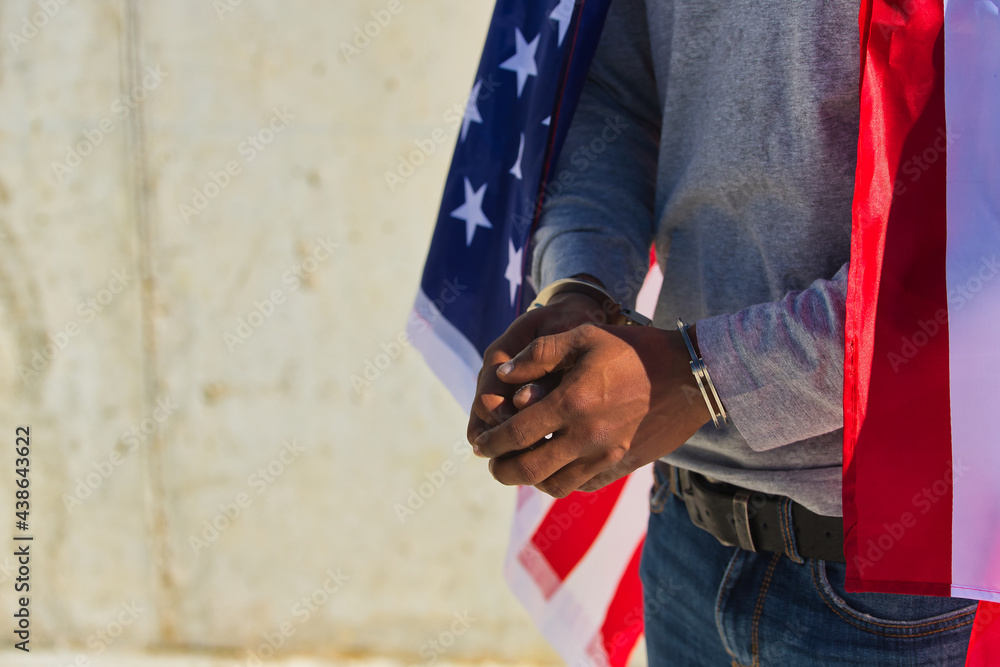 African american person with shackles in his hands and united states ...