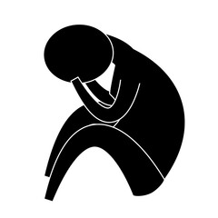 A man sits with his head bowed on his hands and knees. The silhouette is in a pose typical of psychological problems, predicament, depression, despair. Infographic style.