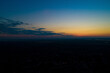 © MaksimM - Sunset or dawn sky over the city from a bird's eye view