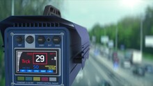Speed control radar controlling car speed, monitoring highway traffic violations. Police traffic speed control camera