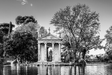 Wall Mural - Temple of Aesculapius on the grounds of the gardens of Villa Borghese, built in the ionic style between 1785 and 1792 by Antonio Asprucci and son Mario Asprucci in Rome, Lazio, Italy