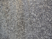 The Texture Is A Sheet Of Galvanized Gray Spotted Iron In Full Screen. Metal Sheathing. Industrial Dirty Background Close-up.