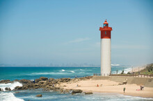 The Umhlanga Rocks Sea Wall And Lighthouse.  Near Durban, South Africa.