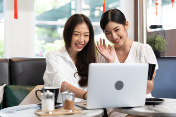 young couple woman talking and using laptop computer in free time