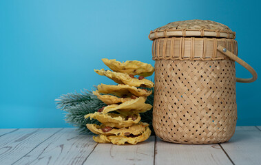 Wall Mural - A serving of rempeyek. Rempeyek is a traditional cookies during Hari Raya celebration. Selective focus points. Blurred background