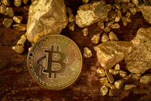 Gold Bitcoin Physical Bitcoin-Cryptocurrency And Gold Nugget Grains. Business Concept