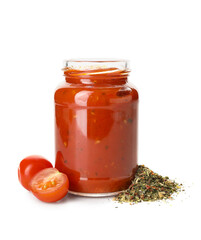 Wall Mural - Glass jar of tasty tomato sauce and spices on white background