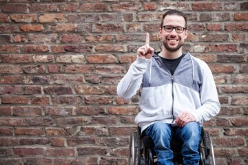 Wall Mural - man in wheelchair counting on his fingers