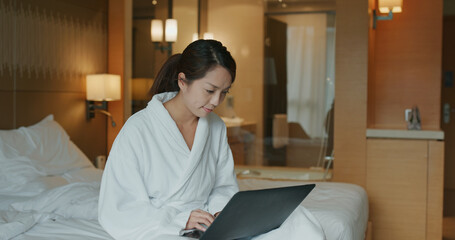 Sticker - Woman work on laptop computer at hotel room