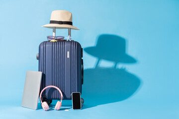 a suitcase is placed on a blue background