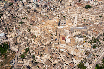 Wall Mural - Morning aerial view of Matera, the city of stones. a flight over a city full of history