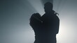 © stockbusters - Silhouette of sensual couple hugging indoors. Romantic man woman dancing.