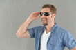 © aletia2011 - Portrait of  handsome young man posing in sunglasses
