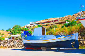 Wall Mural - Wooden fishing boat in land for repairs Mykonos island greece Cyclades