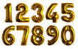 inflatable golden numbers made of foil on a white isolated background