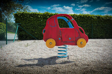 Red Car - Kids Spring Rider On Empty Playground