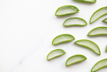 Natural Green Aloe Vera Stem Cut Into Slices. Health And Well Being Background