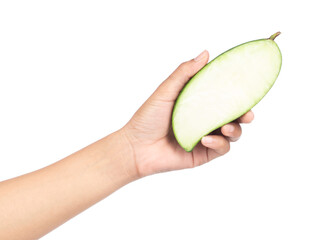 Canvas Print - hand holding cut of green mango isolated on a white background.